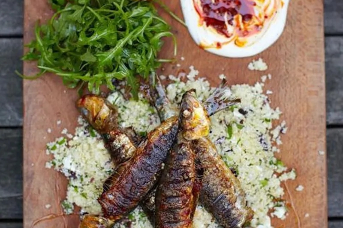 Сардины с пастой харисса и кускусом